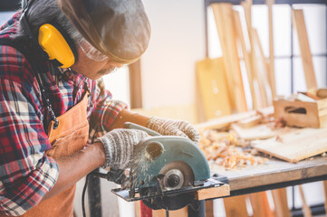 professional carpenters work creatively at home, creative carpenter trainer workshop, craftsman...