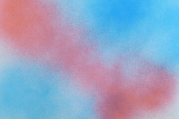 spray paint red and blue on a white paper background