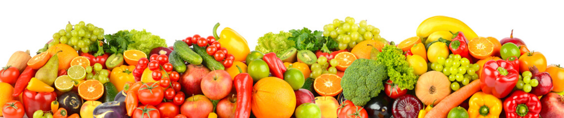 Wide panoramic composition of ripe, juicy fruits and vegetables isolated on white