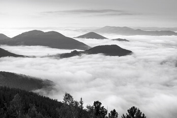 Fototapeta na wymiar Rocks above the fog