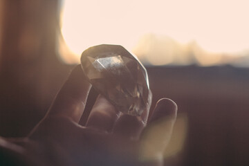 hand holding a crystal