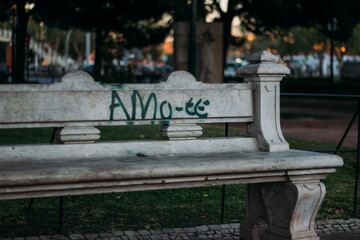bench in the park with "i love u"