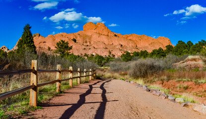 A wooden fence with a shadow from the sun, Garden of the Gods, US