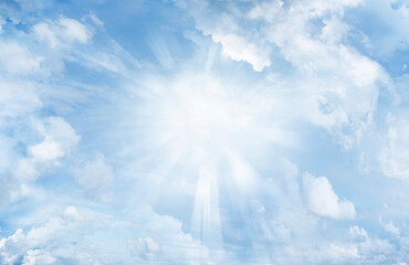 Obraz na płótnie Canvas Rays in blue summer sky background
