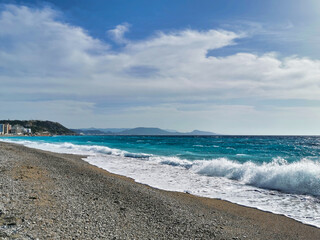 beach view with wild water in rhodes