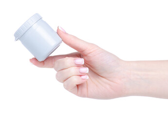 White gray plastic jar cream health care in hand on white background isolation