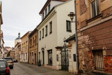 Fototapeta na wymiar Late baroque synagogue in Jewish Quarter, picturesque street with baroque and renaissance historical buildings, cityscape of medieval town, Bohemian Paradise, Turnov, Czech Republic