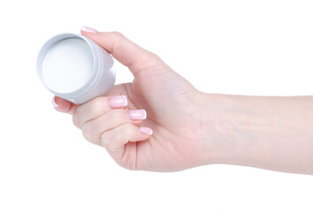 White gray plastic jar cream health care in hand on white background isolation