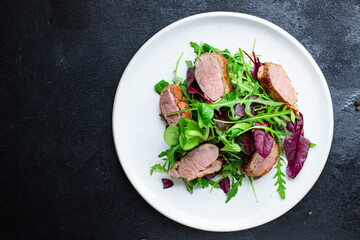 salad duck breast mix green lettuce leaves snack portion on the table healthy meal top view copy space food background rustic 