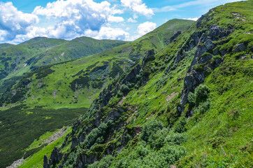 Green mountain landscape with highest ridge of Ukrainian Carpathians, Chornohora at sunny summer day