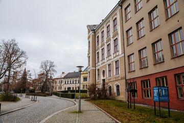 Obraz premium Historical building of Secondary School of Applied Arts and Higher Vocational School, cityscape of medieval town in winter day, Bohemian Paradise, Turnov, Czech Republic