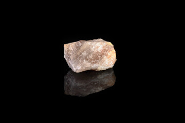 Natural mineral - Polychrome fluorite from Transbaikalia, Russia on black glass background.