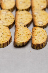 cantucci in the pan for baking, Making twice-cooked, Biscotti in a row for cooking