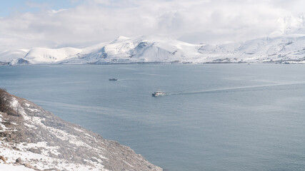 Van, Turkey - February 2020: Vast scenery of Lake of Van with snow and winter landscape