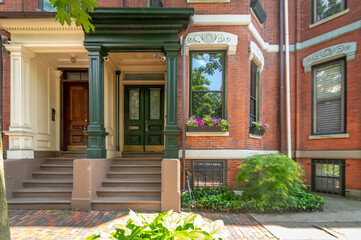 The front steps of a brownstone