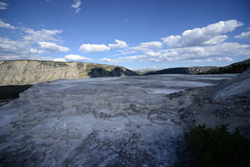 Scenic view of the extreme terrain near Mammoth Hot Springs at Yellowstone National Park on a sunny day