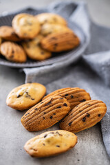 Madeleine with chocolate. Traditional French small cakes.