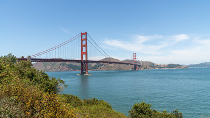 San Francisco, USA - August 2019: Golden Gate Bridge on a sunny summer day. The Golden Gate Bridge is a suspension bridge spanning the Golden Gate.
