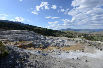 Fototapeta na wymiar Scenic view of the terraces at Mammoth Hot Springs at Yellowstone National Park on a sunny day