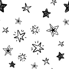 hand drawn stars seamless pattern. Doodle star texture. Sky and night background.