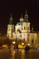 Fototapeta na wymiar Europe, Czech Republic, Prague. St. Nicholas Church in Old Town Hall at night.