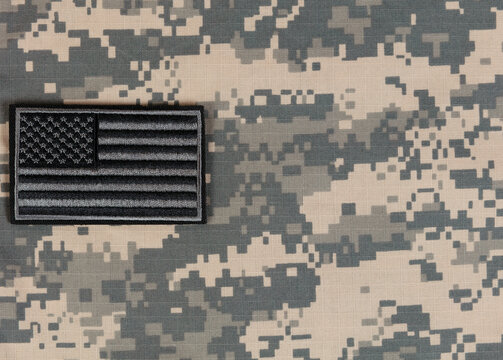 Military clothing and US flag background for the holidays of Memorial, 4th of July and Labor Day
