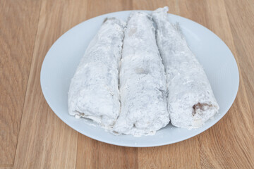 In the process of cooking fish - pressed with flour