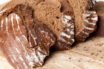 black rye bread divided into parts