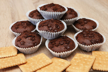 Delicious chocolate muffins with petit cookie