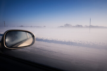 Fototapeta na wymiar driving in the snow
