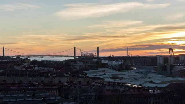Sunset over the city Gothenburg, Sweden. Panning shot, Timelapse. 4K. 25p