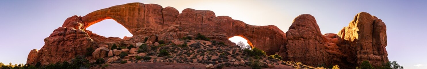 Panorama shot of red sandstone arches at summer sunny day in Arches national park in Utah, America