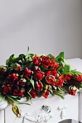 Bouquet of Red Tulips on the light background