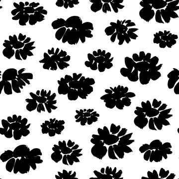 Brush flower vector seamless pattern. Hand drawn botanical ink illustration with floral motif. Chamomile or daisy painted by brush. Hand drawn black print for fabric, wrapping paper, wallpaper design
