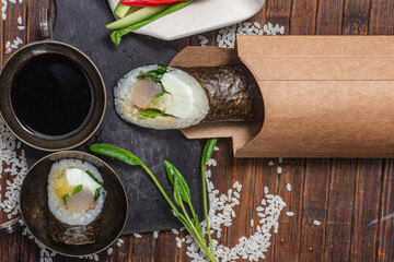 Still life. Japanese cuisine- roll in a package
