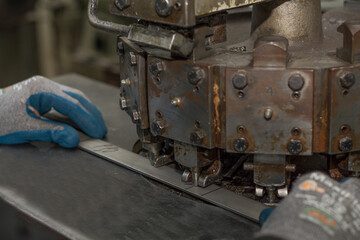 Craft Metalworking - Holes Are Punched In Metal Parts