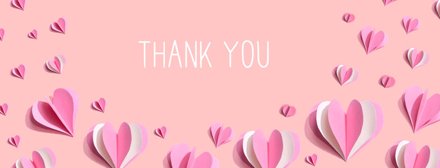 Thank you message with pink paper hearts - flat lay