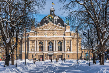 LVIV, UKRAINE - FEBRUARY 10, 2021: The Solomiya Krushelnytska Lviv State Academic Theatre of Opera and Ballet, snow on the squares.