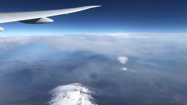 Aerial view on the snow covered Etna Volcano in Italy
