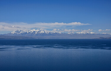 Obraz na płótnie Canvas View of the entire Cordillera Real across Lake Titicaca, Isla del Sol, Bolivia