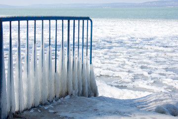 Fence covered with ice at Lake Balaton in Hungary.