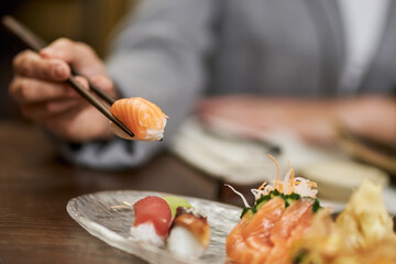 Restaurant using chopsticks for eating sushi