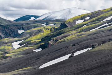 Iceland, Fjallabak Nature Reserve, Landmannalaugar. The deeply eroded mountains are covered with...