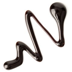 Chocolate syrup drop isolated on white background. Top view.