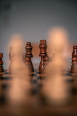 Chess pieces set up ready to play chess game on a wooden board strategy game kings head to head