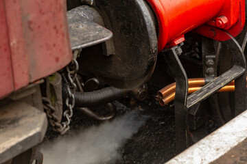 Detail of steam pipe on a steam train
