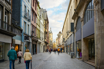 Tourists enjoy a stroll along the shops on the Rue du Gros Orloge in Rouen France with the...