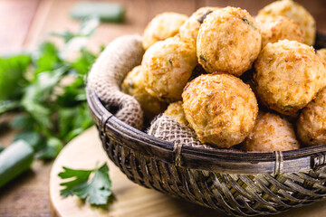 dumpling made of fried rice, with spices, garlic and salt. Croquette typical of Brazilian cuisine