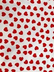 Cute red hearts facing in different directions on white background