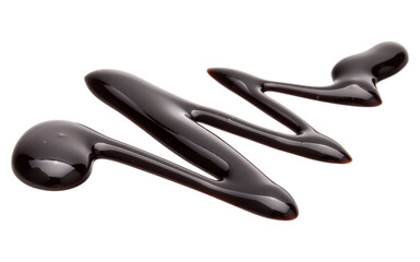 Obraz premium Chocolate syrup drop isolated on white background